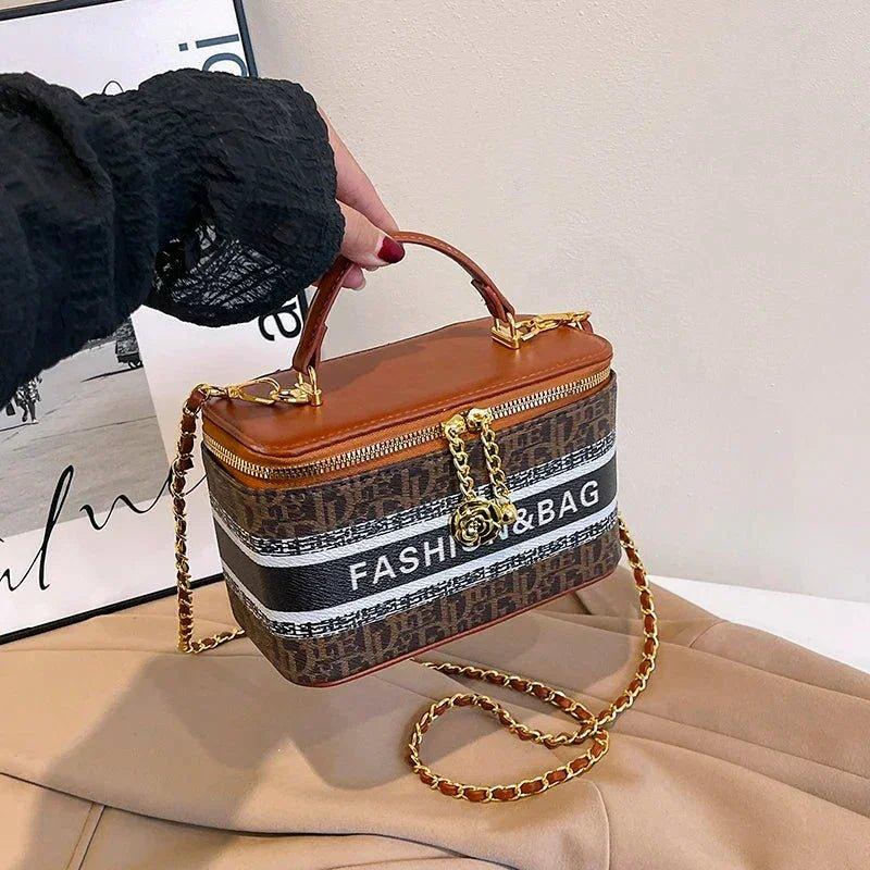 Stylish women's fashion handbag with chain strap and 'FASHION&BAG' print, perfect for trendy outfits.