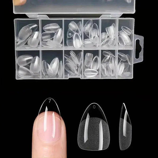 Clear false nail tips in organizer box, assorted sizes for manicure and nail art, shown on finger and close-up