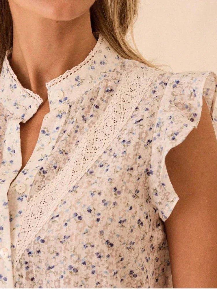 Floral print women's blouse with lace trim and ruffle sleeves, perfect for spring fashion