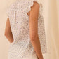 Women's floral sleeveless blouse with ruffled collar and back detail, perfect for spring fashion