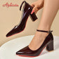 Women's glossy burgundy pumps with ankle strap and red sole, stylish high heels for fashion