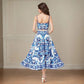 Blue and white patterned two-piece women's fashion dress with flared skirt and open back