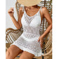 White crochet beach dress with lace detailing, straw hat, wicker chair – women’s summer fashion