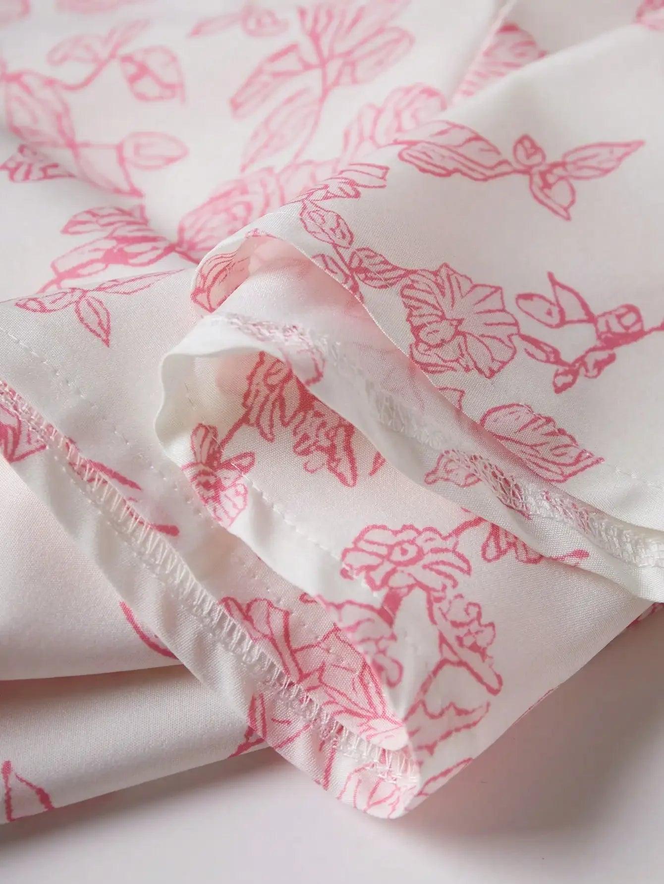 White fabric with pink floral print, soft texture and delicate stitching for women's fashion