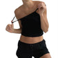 Woman in black one-shoulder crop top and shorts, stylish casual fashion set