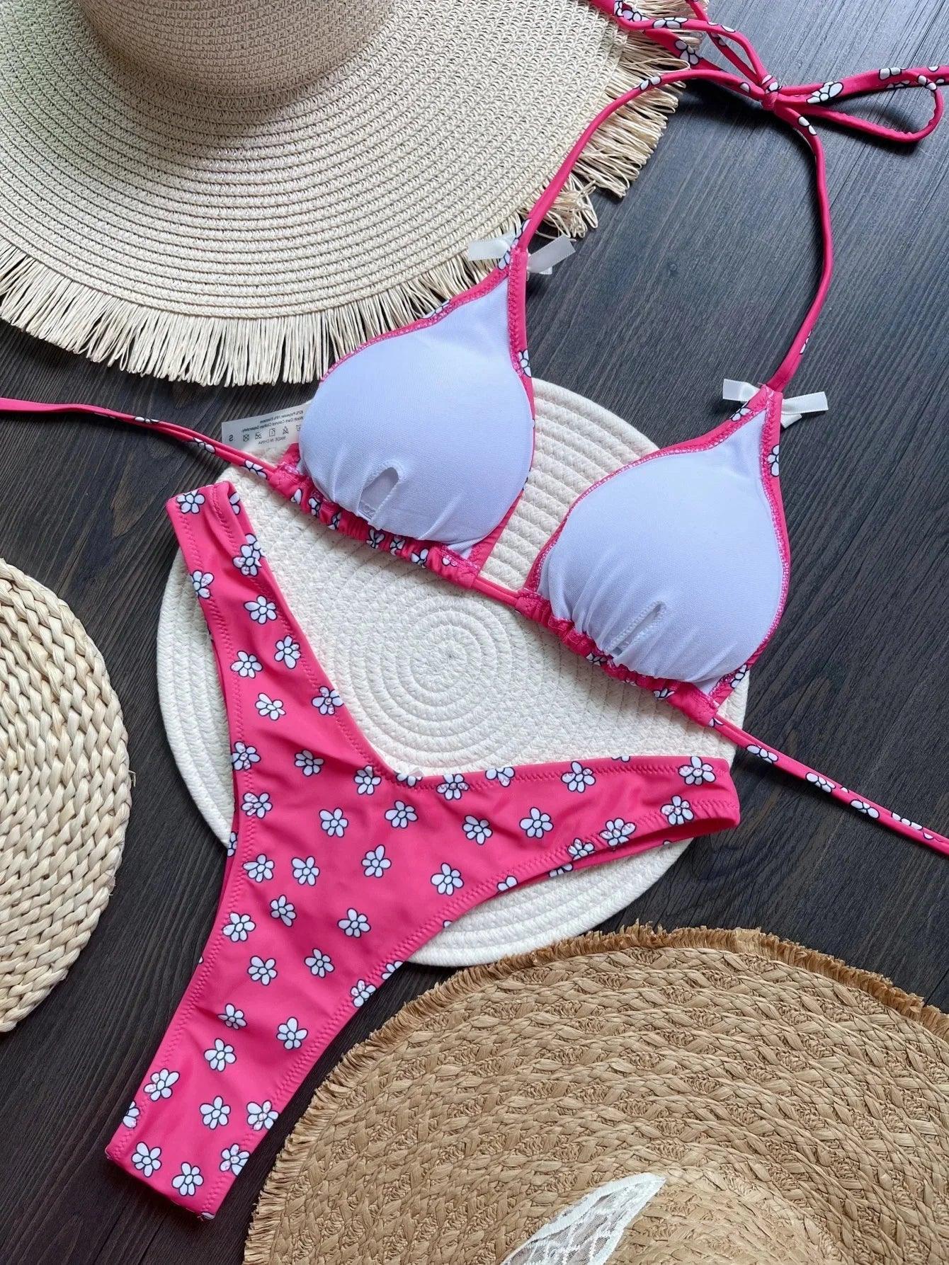 Pink floral bikini set with white top, styled with straw hats for summer fashion