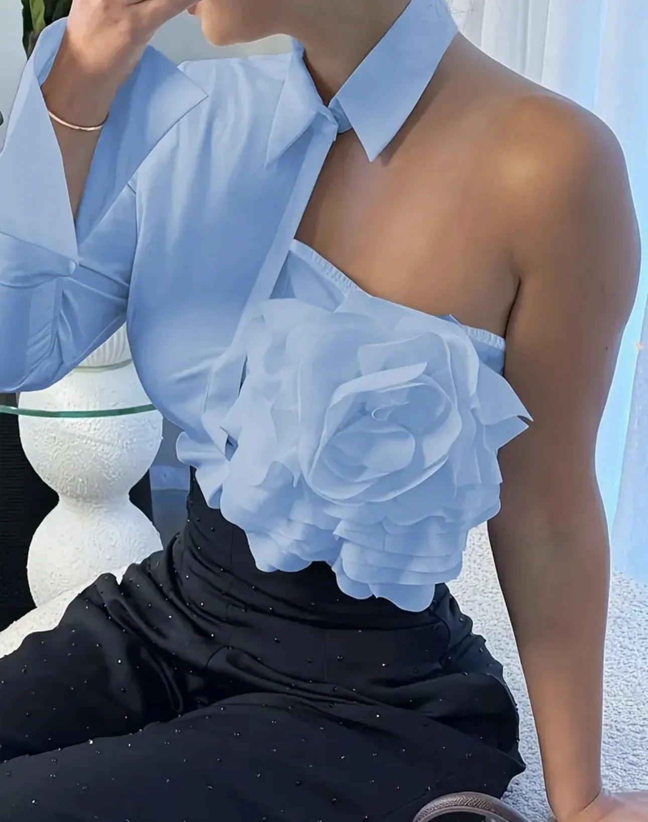 Light blue one-shoulder blouse with floral ruffle detail, paired with black embellished skirt for women's fashion