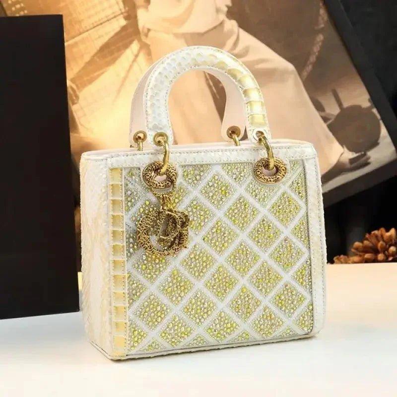 Elegant white and gold crystal-embellished handbag with quilted design, perfect for women's fashion