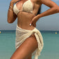 Cream ruched bikini top and matching sarong at beach, women's summer swimwear fashion