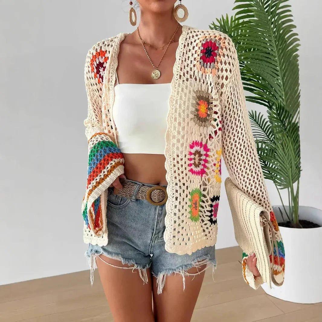 Boho crochet cardigan with floral patterns, paired with denim shorts and white top for women's fashion