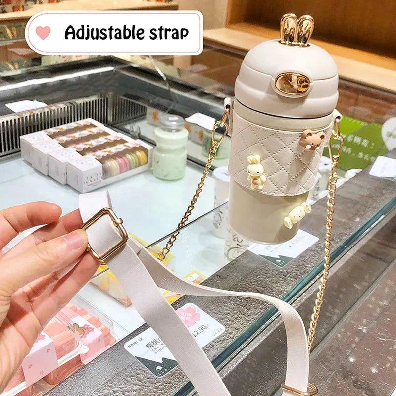 Cute bunny water bottle with adjustable strap and gold chain, perfect for women's fashion