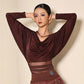 Woman in elegant burgundy dance top with cowl neck and sheer waist, perfect for ballroom fashion