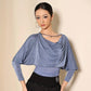 Elegant blue drape top with long sleeves for women's fashion, paired with black fringe skirt