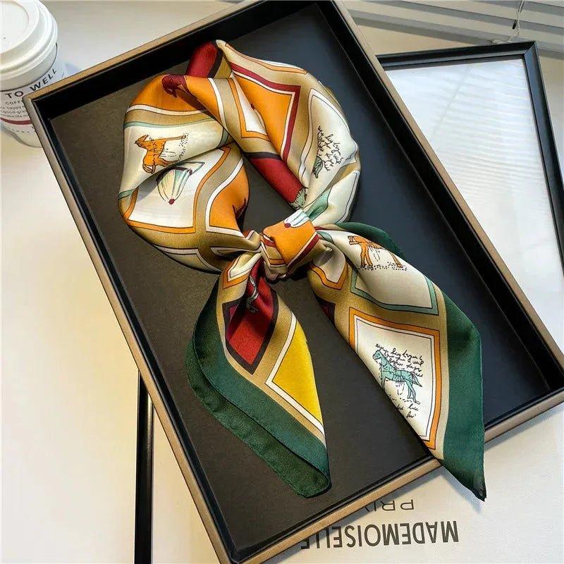 Elegant women's silk scarf with vintage horse print, styled in gift box for fashion accessories