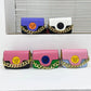 Colorful women's fashion handbags with gold chain straps and Medusa emblem, perfect for stylish outfits.