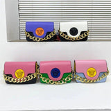 Colorful women's fashion handbags with gold chain straps and Medusa emblem, perfect for stylish outfits.