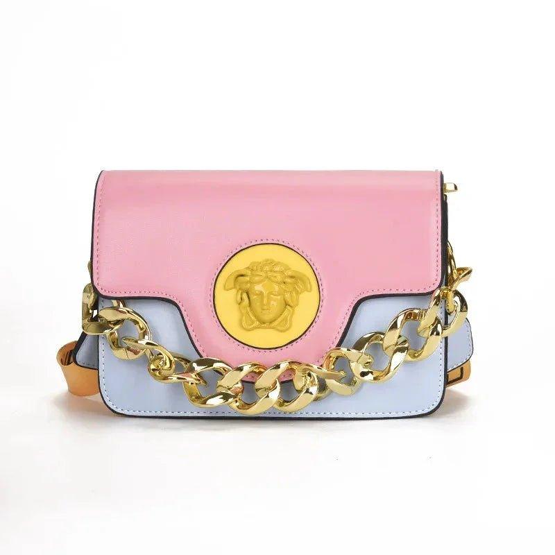 Pink and blue women's fashion handbag with gold chain strap and Medusa emblem