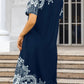 Navy blue women's dress with white lace print, short sleeves, knee-length, casual fashion style