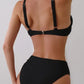 Black high-waisted bikini with adjustable straps, women's swimwear fashion