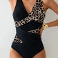 Black and leopard print one-piece swimsuit with wrap design, stylish women's swimwear