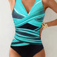 Women's turquoise and black one-piece swimsuit with crisscross front design, stylish beachwear fashion