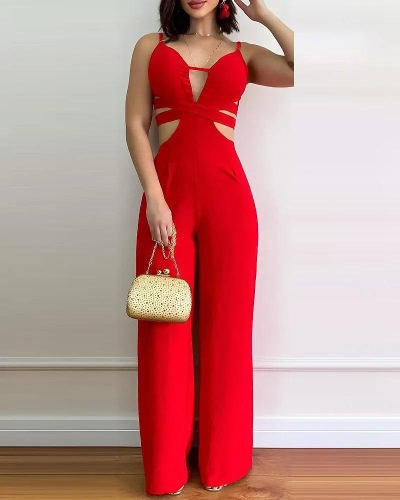 Red cutout jumpsuit for women, stylish wide-leg fashion with gold clutch accessory