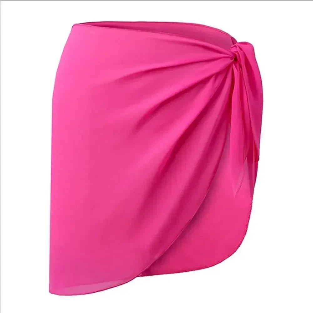Vibrant pink women's wrap skirt with side knot detail, stylish fashion apparel