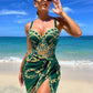 Green patterned beach dress with chain print, perfect for summer fashion and beachwear