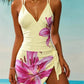 Women's floral print beach dress with pink lily design, perfect for summer fashion and beachwear.