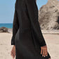 Black textured long-sleeve beach dress with flared sleeves, perfect for summer fashion