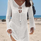 White crochet beach cover-up dress with long sleeves and V-neck tie, perfect for summer fashion