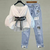 White puff sleeve top with black belt & distressed patch denim jeans for women's fashion