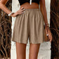 Beige pleated high-waist women's shorts with elastic waist, summer fashion outfit