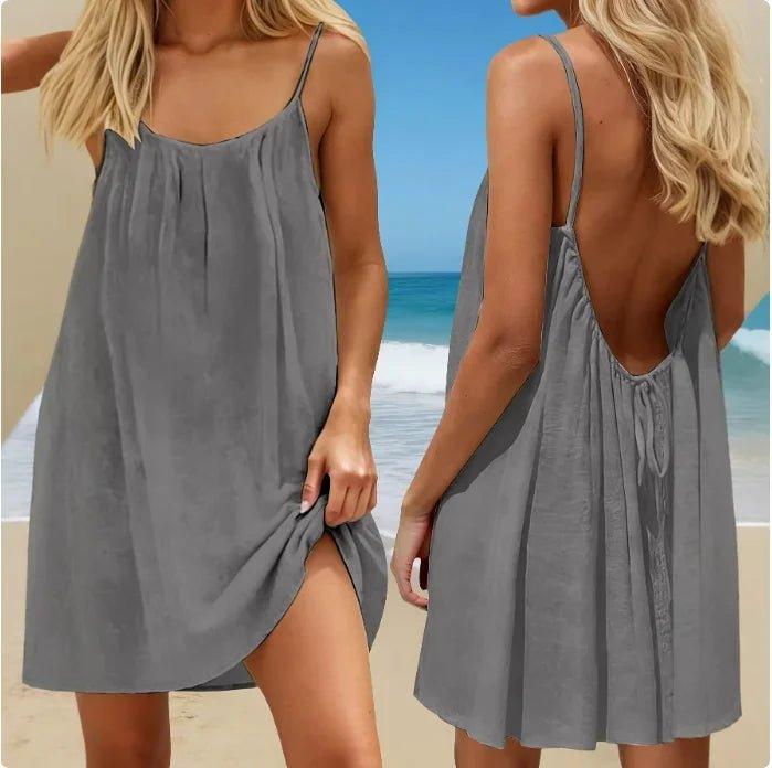 Gray beach dress with open back and side slit, perfect for summer fashion