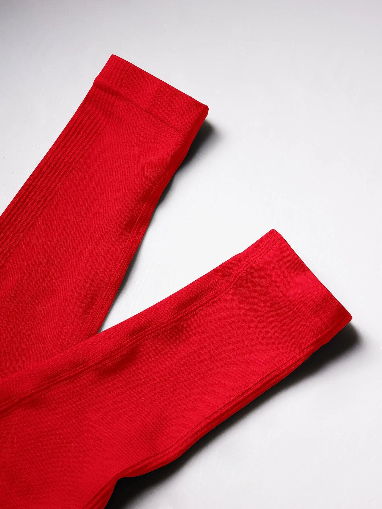 Vibrant red women's leggings with ribbed waistband, ideal for fashion and active wear