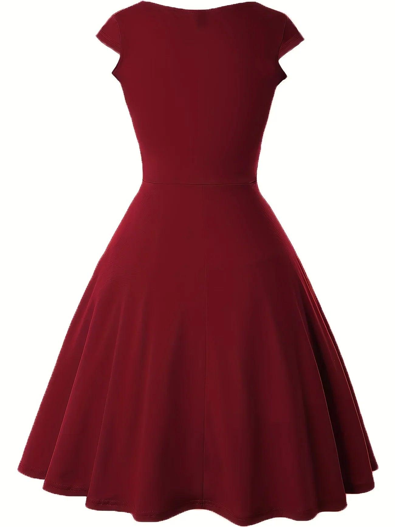 Burgundy vintage-style women's dress with cap sleeves and flared skirt, perfect for elegant occasions