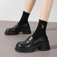 Black platform loafers with chunky heels paired with moon-embroidered socks, women's fashion footwear